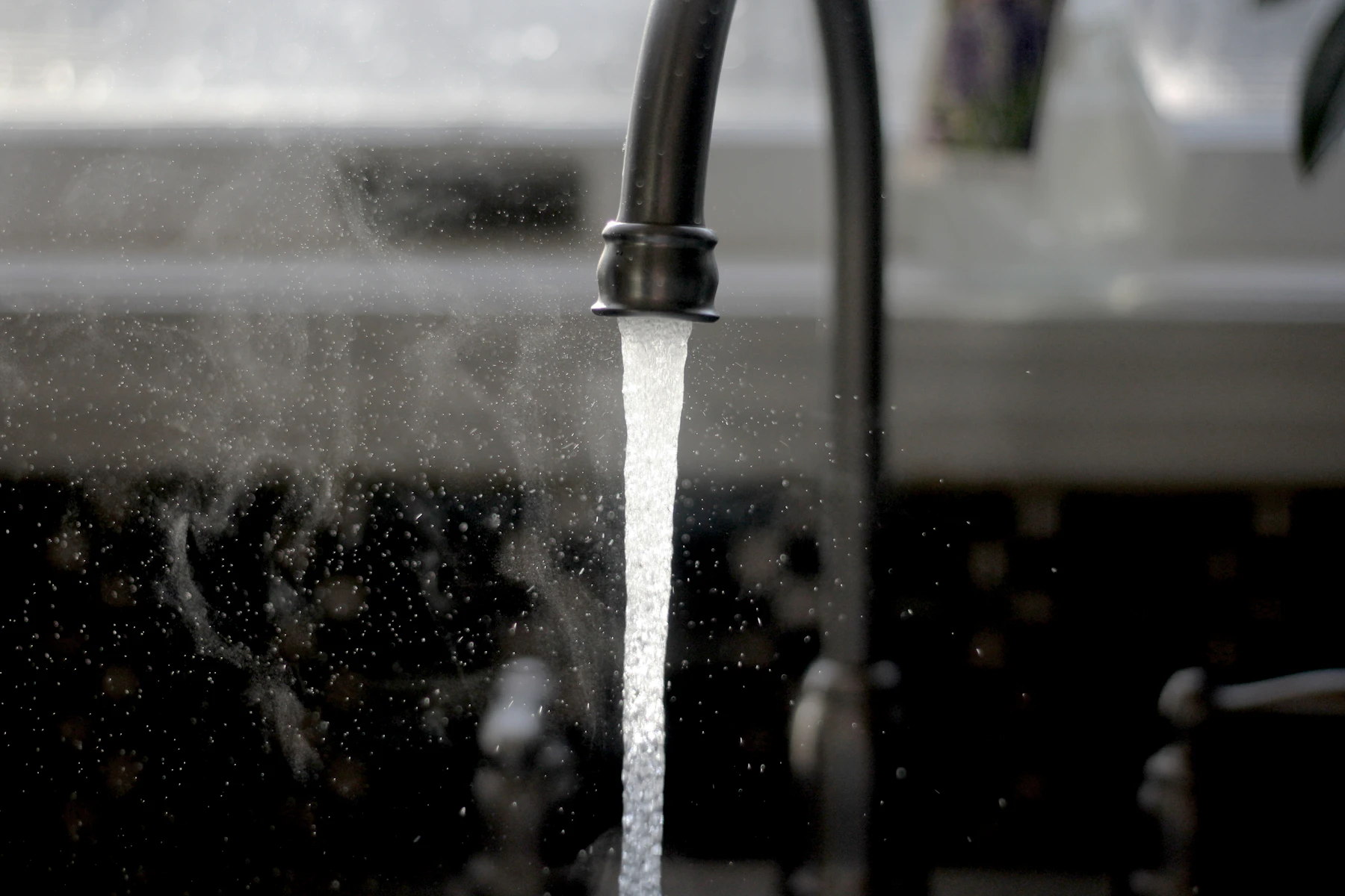 Water running from a kitchen faucet